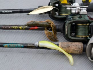 The three lures Stevie Nick uses exclusively are (top to bottom) a 1/2-ounce gold Johnson Sprite spoon, an Alabama craw-colored NetBait Baby Paca Craw on a 1/4-ounce Rockport Rattler jighead and a lemonhead-colored Matrix Shad on a 1/4-ounce Goldeneye jighead.