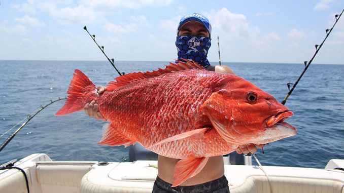Andrew Duval, 17, of Patterson with a red snapper caught 120 miles into the Gulf from Berwick.