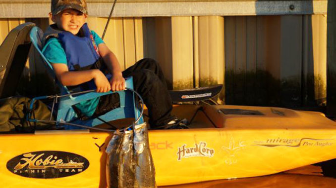 Five-year-old Caleb Kellum managed to catch a few nice specks while riding in the back of his dad’s kayak. Trolling is a great way to get young children involved in fishing.