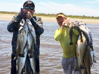 Sammy Romano, left, and Cabot Corso enjoyed an epic day in the surf at Elmer’s Island last April, catching limits of specks using suspended jerkbaits.