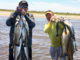 Sammy Romano, left, and Cabot Corso enjoyed an epic day in the surf at Elmer’s Island last April, catching limits of specks using suspended jerkbaits.