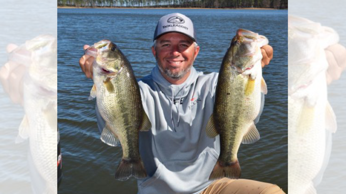 Guide Darold Gleason shows off a couple of nice bass up at Toledo Bend.