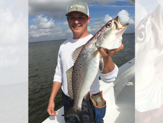 Chris Lake holds a nice Lake Decade speckled trout.