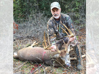 Larry Bringol, of Youngsville, poses with the big Natchitoches Parish 10-pointer he shot on Nov. 18 near Provencal. The buck green-scored about 173 inches of bone.