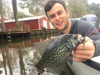 Author Joel Masson shows off a sac-a-lait he caught from a cut off the Tchefuncte last spring.