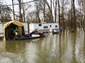 Tensas Parish deer hunters removed gear from their campers as flood waters rose in January. Even mobile camps like these got flooded because before water rose quickly, and roads went under and were closed.