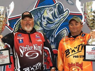 ACT tournament champions Tony Hughes and Jeff Riddle.