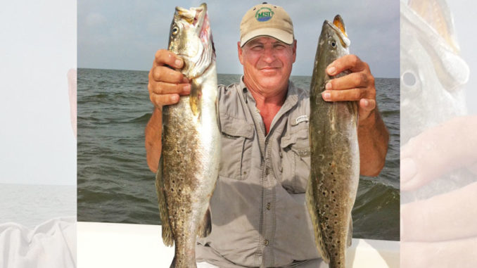 Mike White caught these two mega-trout while fishing Grand Isle last summer.
