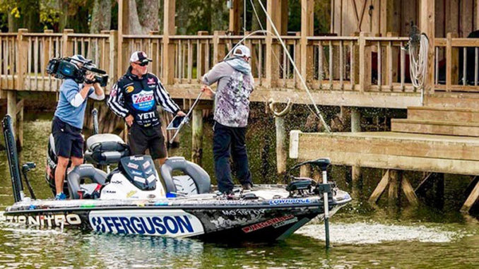 An angler lands a keeper in the MLF World Championship on Lake St. John, held earlier this year to be broadcast on TV beginning this weekend.