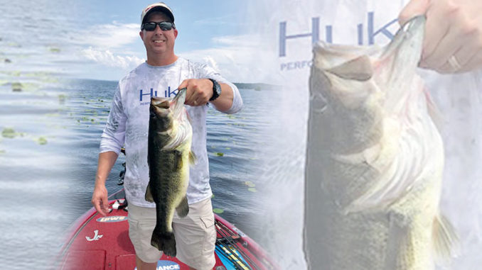Nick Terry shows off a 61/2-pound bass he caught May 31 while fishing in and around lily pads at Toledo Bend with John Dean. Lily pads should hold the key to getting bit in July, according to Dean.