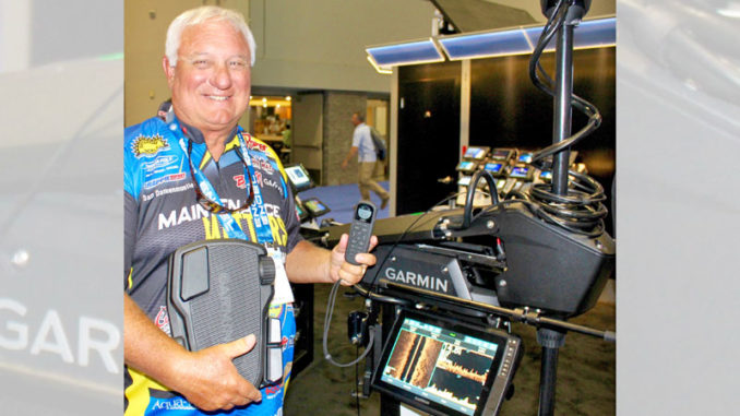 Crappie pro Dan Dannenmueller demonstrates the new Garmin Force trolling motor and a new Garmin scanning sonar unit at the 2019 ICAST show.