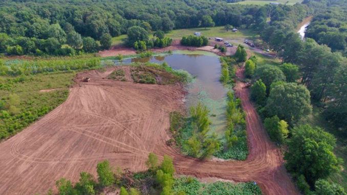 An aerial view of the main dock area shows the area where most of the remaining work is being undertaken.