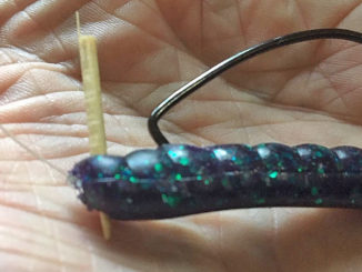 Using the tip of a toothpick, pushed through a soft-plastic bait and the eye of the hook, will help keep a Texas-rigged bait from sliding down. Break off both ends of the toothpick just outside the worm’s margins.