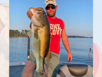 Brett Preuett landed this whopping 8-pound + lunker on a recent “day off” from his fishing job on Caney.