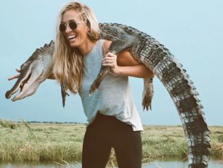 Caitlin Scates of Ponchatoula with her “gator necklace” from a Sept. 21 trip to the Orleans Parish marsh. Will sport-hunting of Louisiana’s alligators control the population if commercial efforts plummet due to a shrinking market for skins?