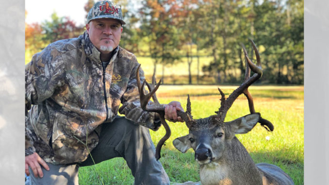 Wade Gibson poses with his 14-point, double drop tine Union Parish buck.