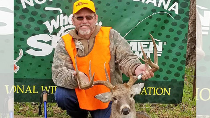 Craig Long and the 161-inch buck he got Dec. 8 on a handicapped hunt in Natchitoches Parish.