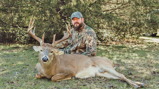 Rick Guillot of Elm Grove with the 12-point, 155-inch buck he killed near Loggy Bayou in Red River Parish.