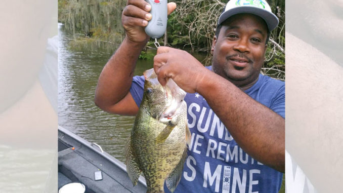 Darren Chambers with the 18-inch, 2.6-pound sac-a-lait he caught using live bait in the Lake Verret area.