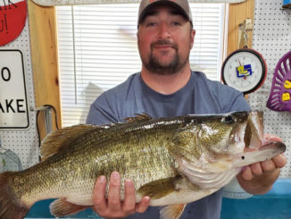 DeRidder’s Jonathan Harper displays his Toledo Bend lunker weighing 10.92 pounds taken Feb. 28 on a ¾-ounce, black/blue Santone Football jig with a black/blue Zoom Speed Craw in the Indian Creek area.