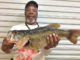Michael Kelly of Zachary displays his huge Toledo Bend 10.45-pounder taken near Alpine Landing on a YUM Dinger Bama Bug. (Photo courtesy of Toledo Bend Lake Association)