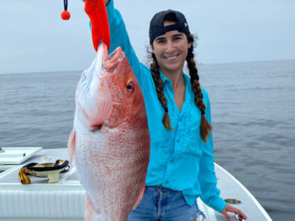 Kaitlin Kopsco with a red snapper caught out of Port Fourchon on July 4.