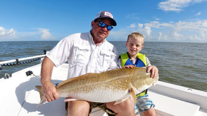 Seven-year-old Carter Barnett fished with his peepaw, Charlie Barnett, in Venice getting on the bull reds.