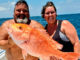 Chuk Cole and Jessica Spooner with Jessica’s 22.4-pound snapper caught out of Venice on July 18, 2020.