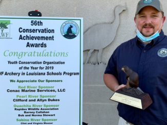 LDWF's Chad Moore, who oversees the Archery in Louisiana Schools program, with the 2019 Youth Conservation Organization award.