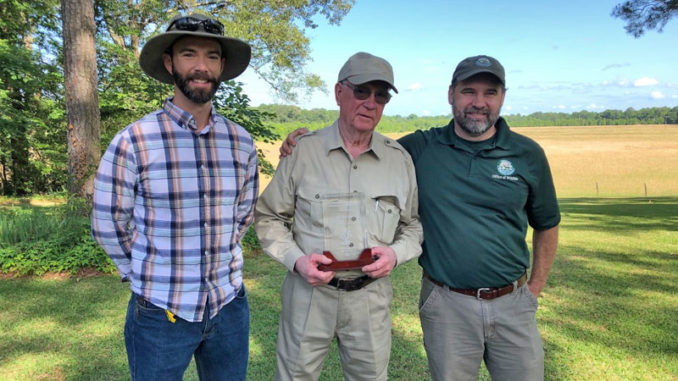 Ed Justice (center) accepts the Lower Mississippi Valley Joint Venture’s 2020 Private Landowner Conservation Champion Award, joined by his son John Justice (left), and John Hanks (right), Louisiana Dept. of Wildlife & Fisheries Biologist Supervisor.