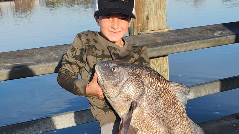 Myles fishes in Lafitte