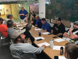 Rod Jenkins lectures a class of archers on the process that goes into making accurate shots, time and time again. (Photo by Sammy Romano)