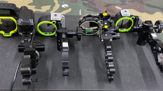 Main types of bow sights are (left to right): electronic range-finding, multi-pin slider, multi-pin fixed, and single-pin adjustable.