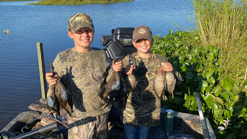 Colt and Patrick 2021 teal