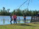A family fishing together at the Bayou Country Sports Complex in Houma after it was recently stocked with adult-sized channel catfish.