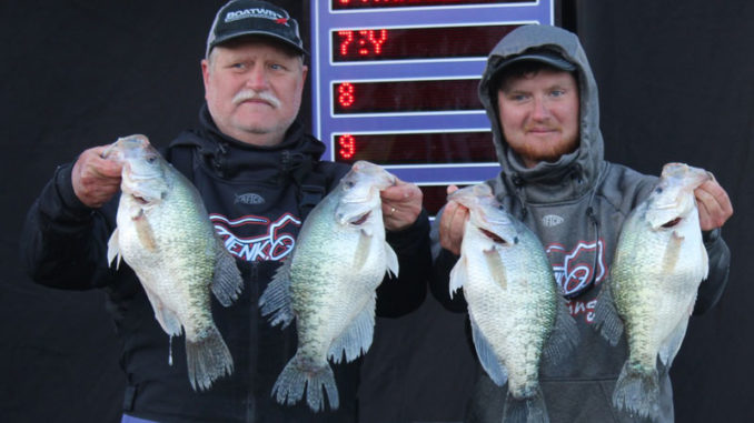 Matthew, right, and Bruce Rogers with four of the 3-pound plus Grenada crappie that helped them to the Crappie Masters Championship. (Photo courtesy Blake Jackson)