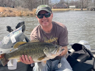 Rudy Rudisill with his 12-4 Cross Lake lunker bass.