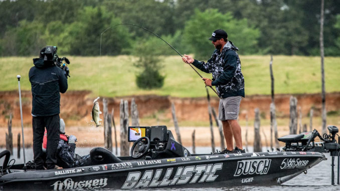 Lee Livesay landing some of the fish that helped him claim $100,000 as champion of the Bassmaster Elite event on Lake Fork, Texas. (Photo courtesy of BASS)
