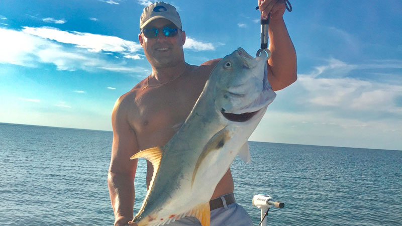Don Barcelona with a Jack Crevalle taken with a topwater lure on the south side of Lake Pontchartrain near New Orleans East and the Trestle bridge in August a few years ago.