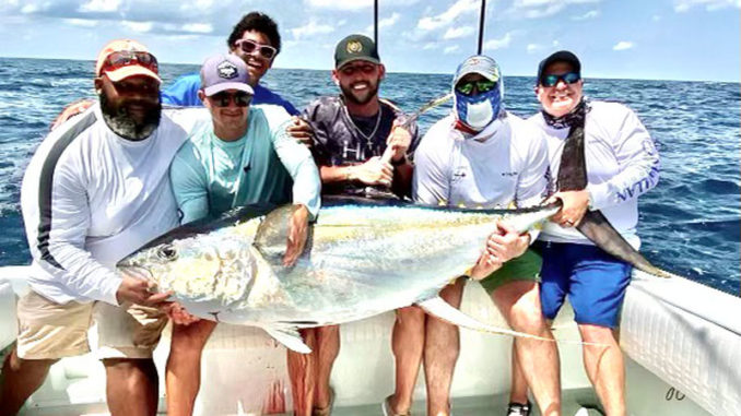 Team Tuna and their monster yellowfin tuna that weighed almost 250 pounds.