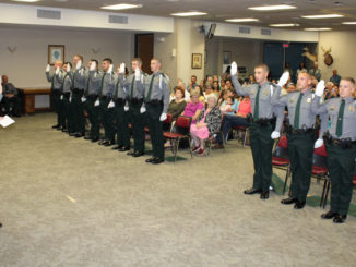 Col. Chad Hebert reading the Oath of Office to the graduation class. (Photo courtesy LDWF)