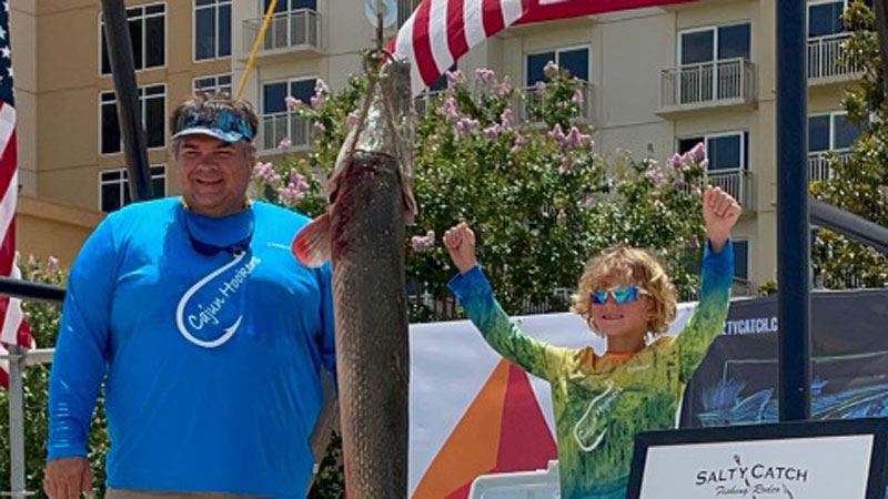 Slade Dowden was with his Paw Paw Andy Martarona when he won first place in the Gar division.