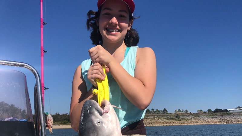 Shelby Carrington, 15, was fishing in Rapides Parish on the Red River when she caught this blue cat that weighed slightly over 40 pounds.