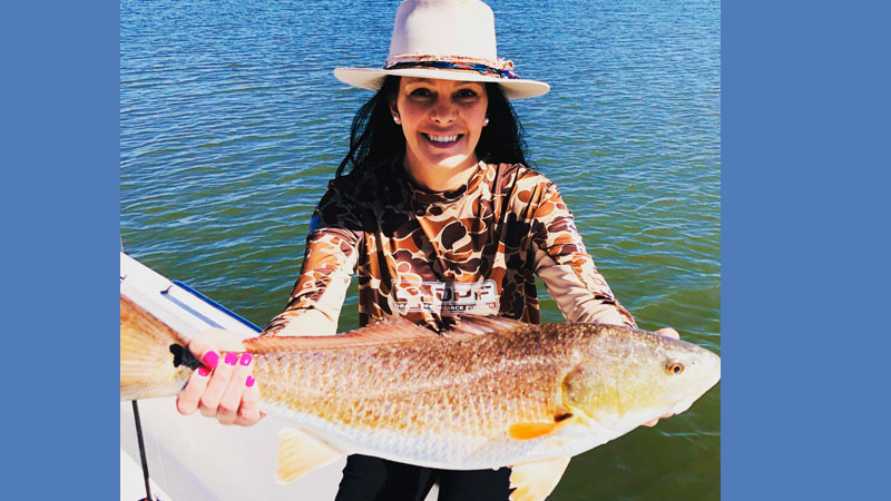 Erica Baham with Rigolets red