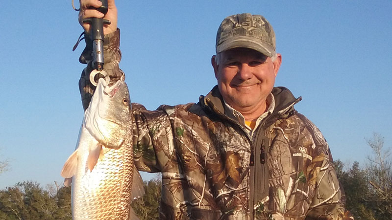 Randy Pellegrin with a nice marsh red caught fishing out of T-Irv's Marina in Dulac.