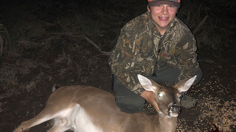 Max DeRoche has to scare off hog to recover doe