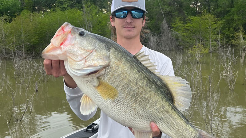Jacob Zeringue with a giant bass caught on Bussey Brake on March 13, 2023.