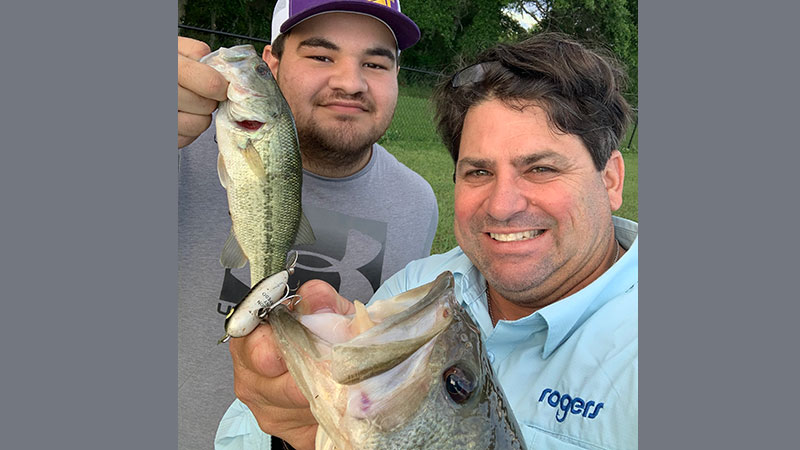 Brandon and John with topwater bass