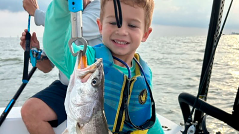 JP Renard with his first speckled trout caught out of Vermilion Bay in May 2023.