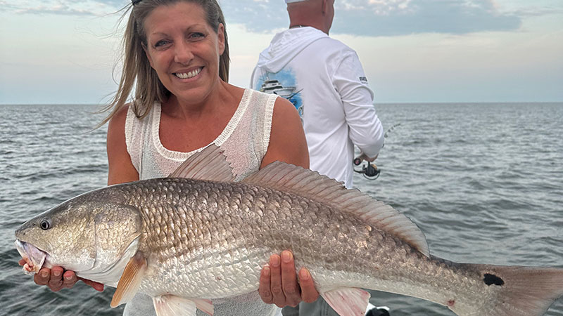 Maggie Schommer caught this bull redfish on May 28 (Memorial Day weekend) bouncing plastics in deep water structure in Lake Pontchartrain.